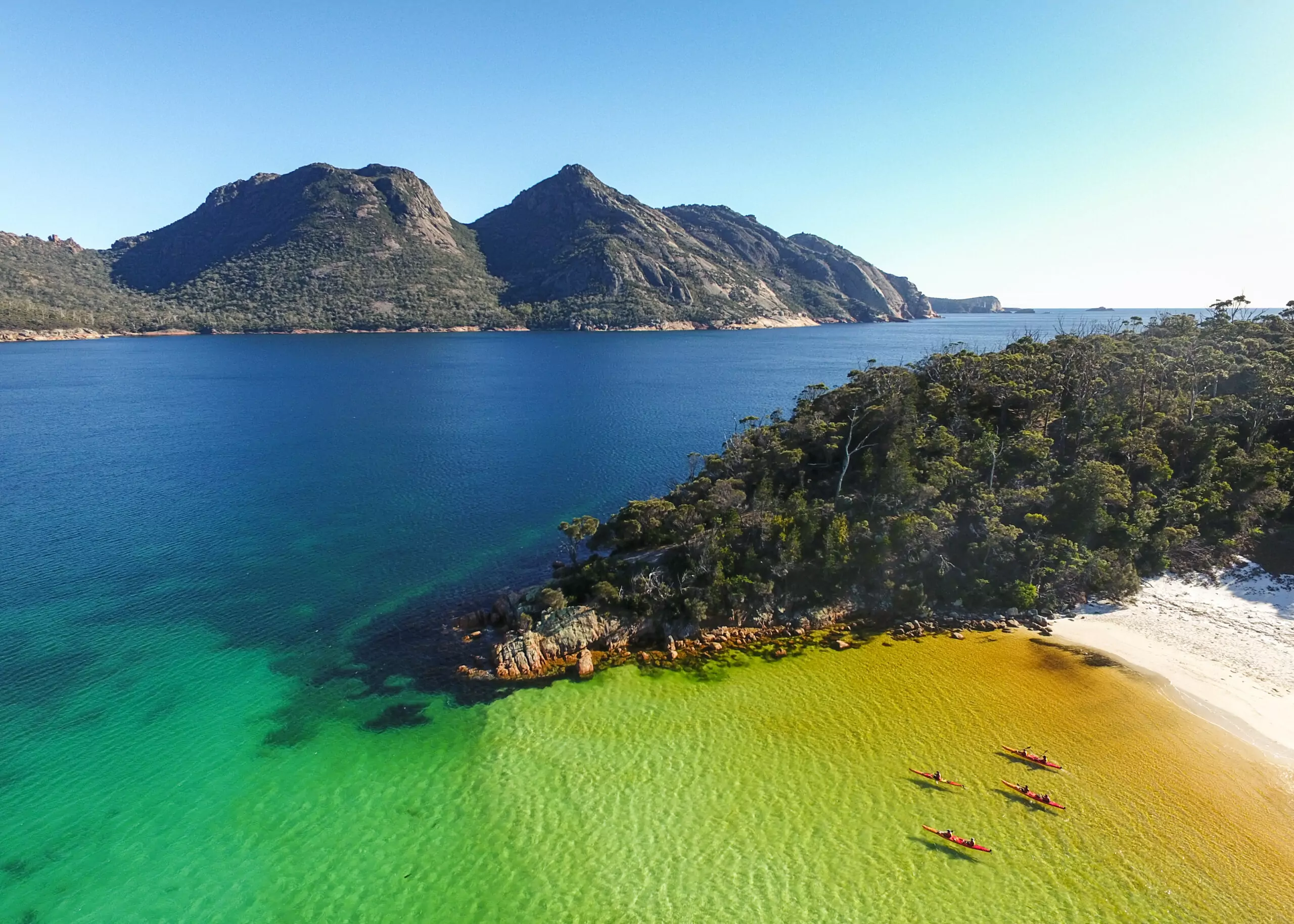 kayakers in beautiful water